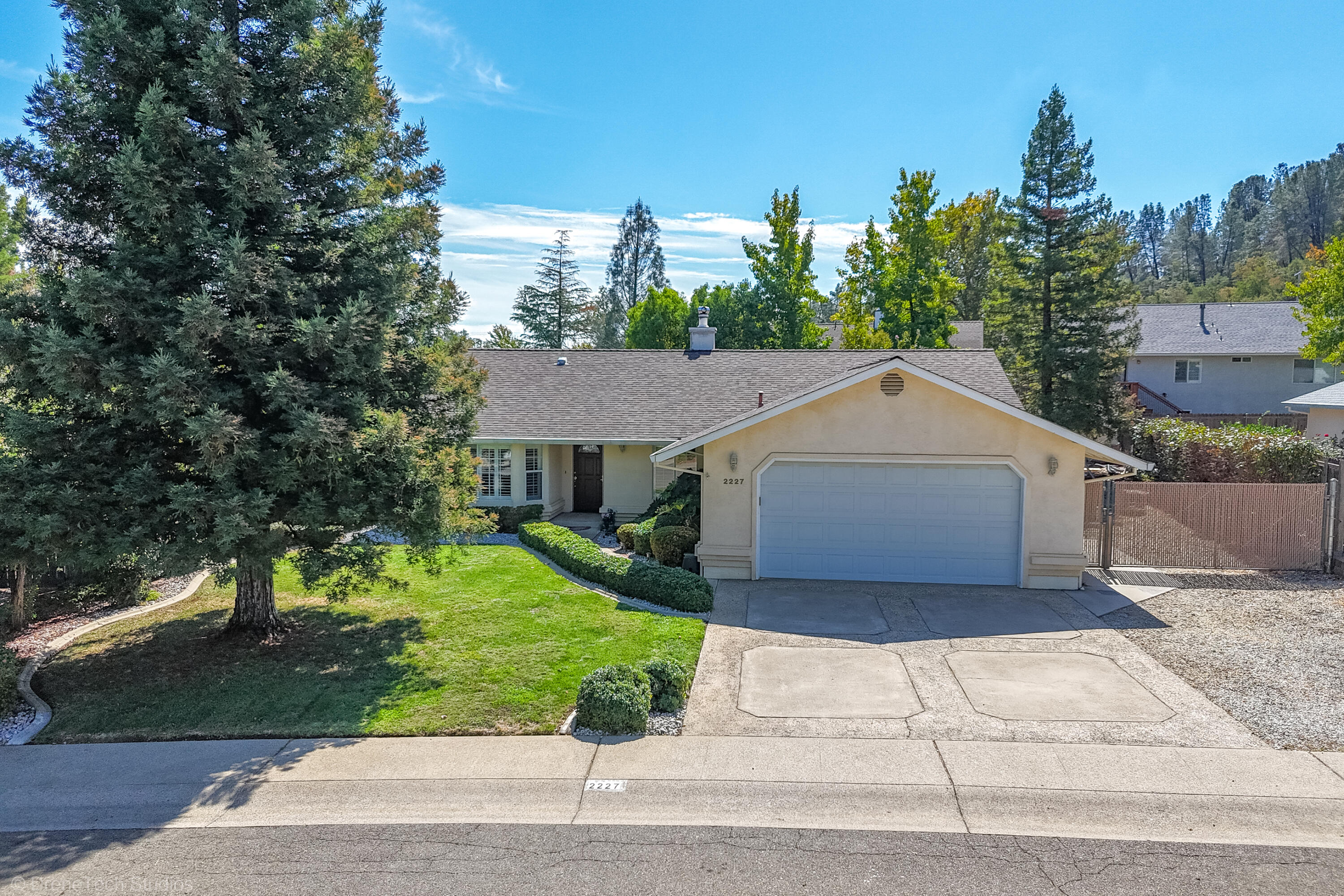 2227 Wicklow Street Redding, CA 96001 - Photo 72 of 90 a house view with a garden space