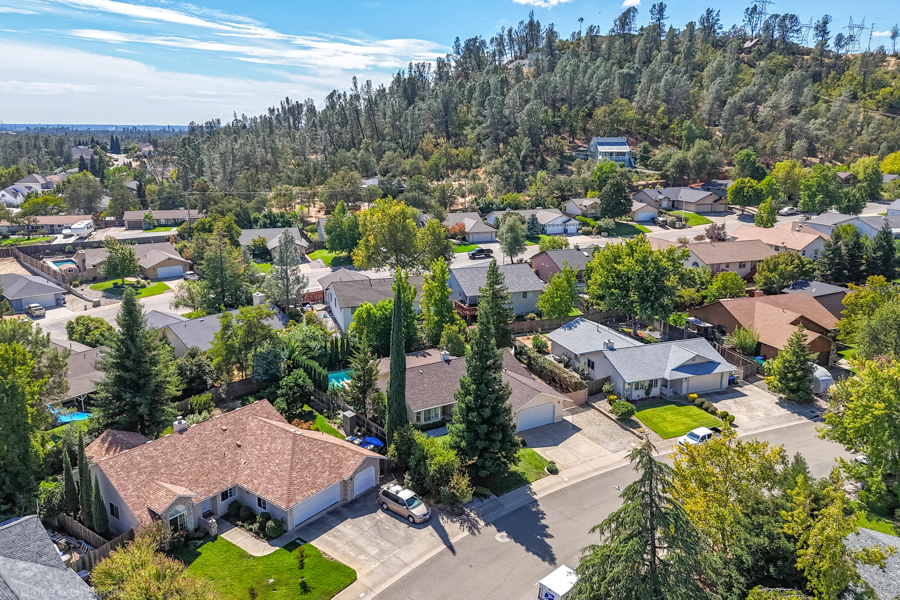 2227 Wicklow Street Redding, CA 96001 - Photo 77 of 90 an aerial view of residential houses with outdoor space and swimming pool