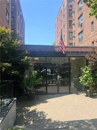 a view of a building with a street