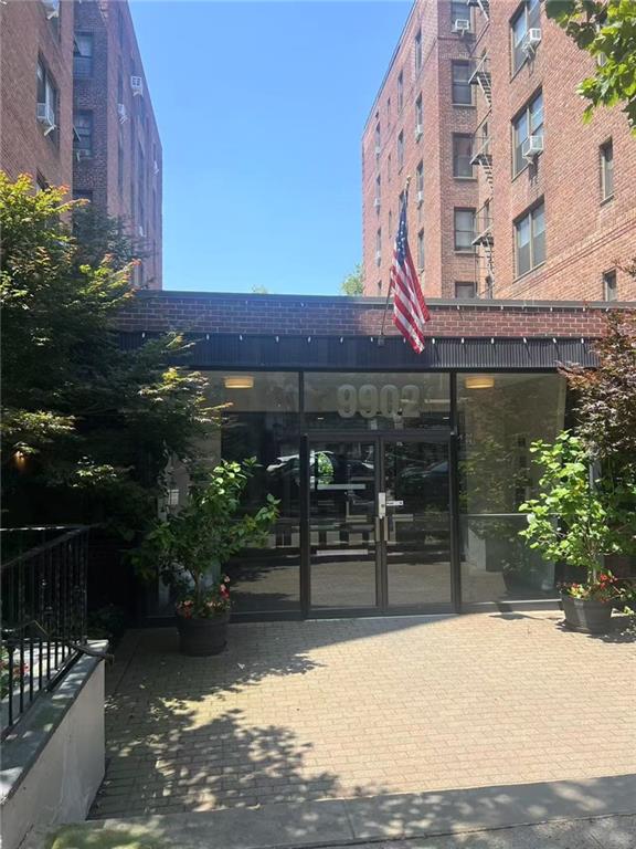 9902 3rd Avenue, Unit 6I Brooklyn, NY 11209 - Photo 1 of 7 a view of a building with a street