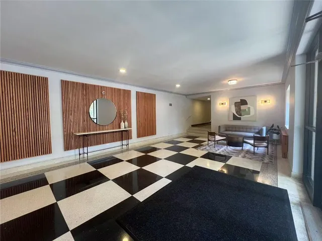 a room with furniture and a rug