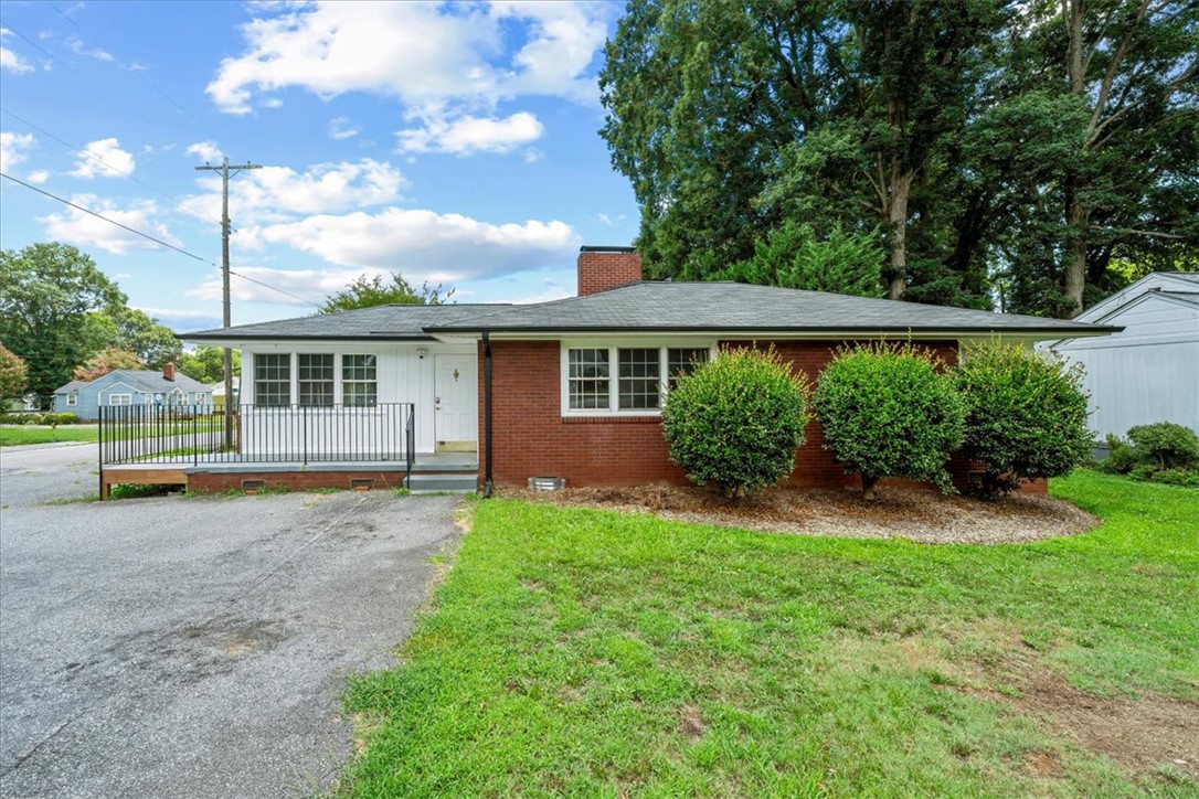212 East Shockley Ferry Road Anderson, SC 29624 - Photo 1 of 28 A classic brick ranch with a welcoming front porch and well-maintained shrubbery.