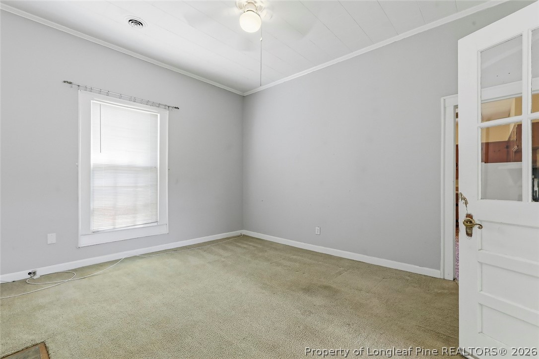 249 Nicholson Road Rockingham, NC 28379 - Photo 19 of 47 an empty room with a empty space and a window