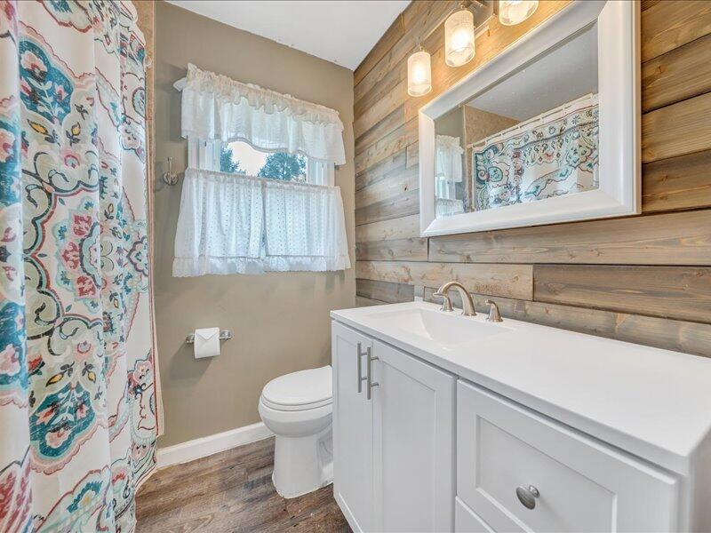 2015 Laura Road Northwest Roanoke, VA 24017 - Photo 17 of 32 a bathroom with a sink and a toilet