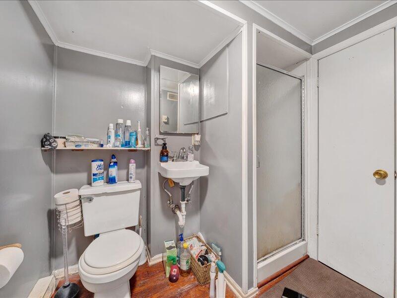 2015 Laura Road Northwest Roanoke, VA 24017 - Photo 22 of 32 a bathroom with a sink mirror vanity and toilet