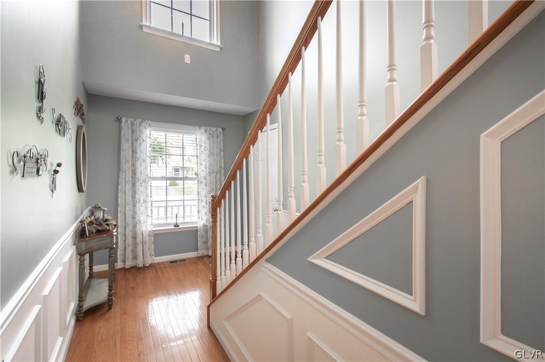 4142 Walter Road Bethlehem, PA 18020 - Photo 21 of 50 a view of an entryway with wooden floor and stairs