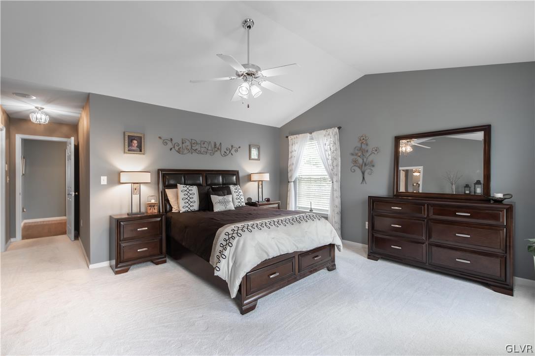 4142 Walter Road Bethlehem, PA 18020 - Photo 36 of 50 a bedroom with a bed and a mirror on dresser