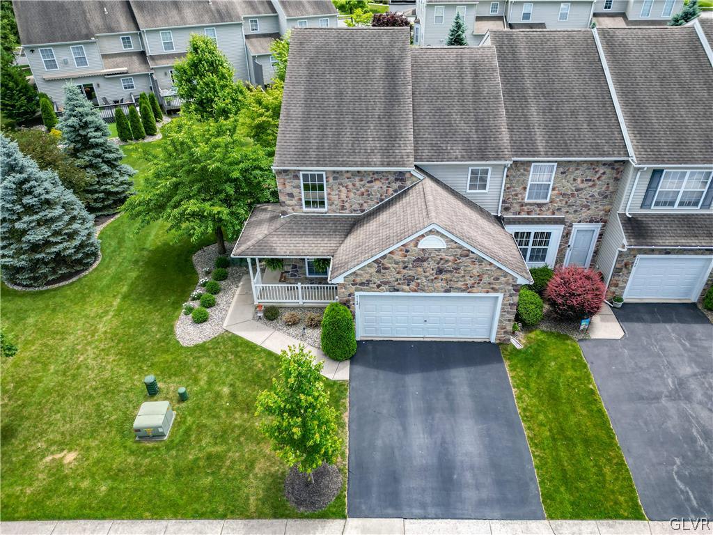 4142 Walter Road Bethlehem, PA 18020 - Photo 50 of 50 an aerial view of a house with garden space and a bench