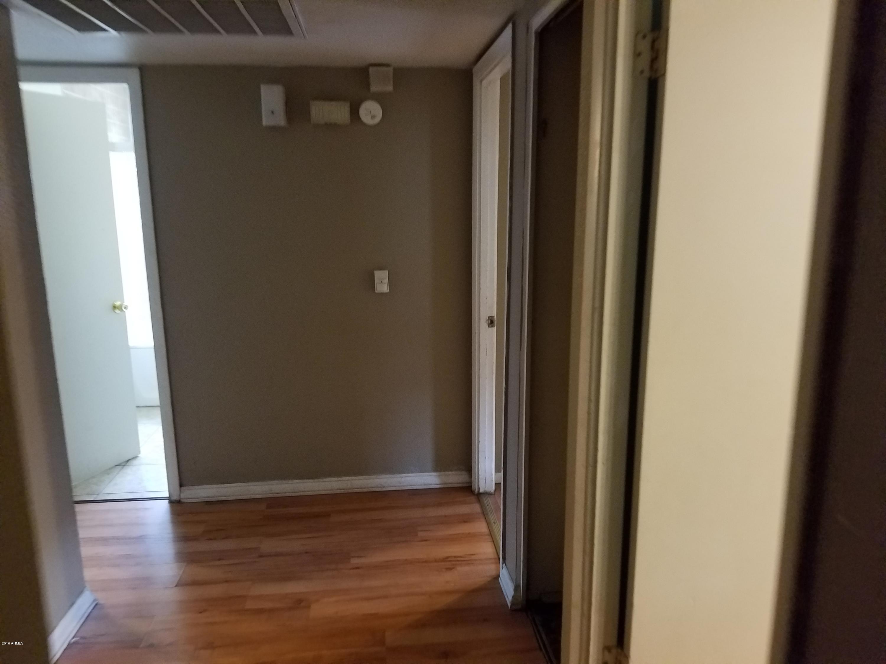4939 West Berkeley Road Phoenix, AZ 85035 - Photo 22 of 60 a view of a hallway