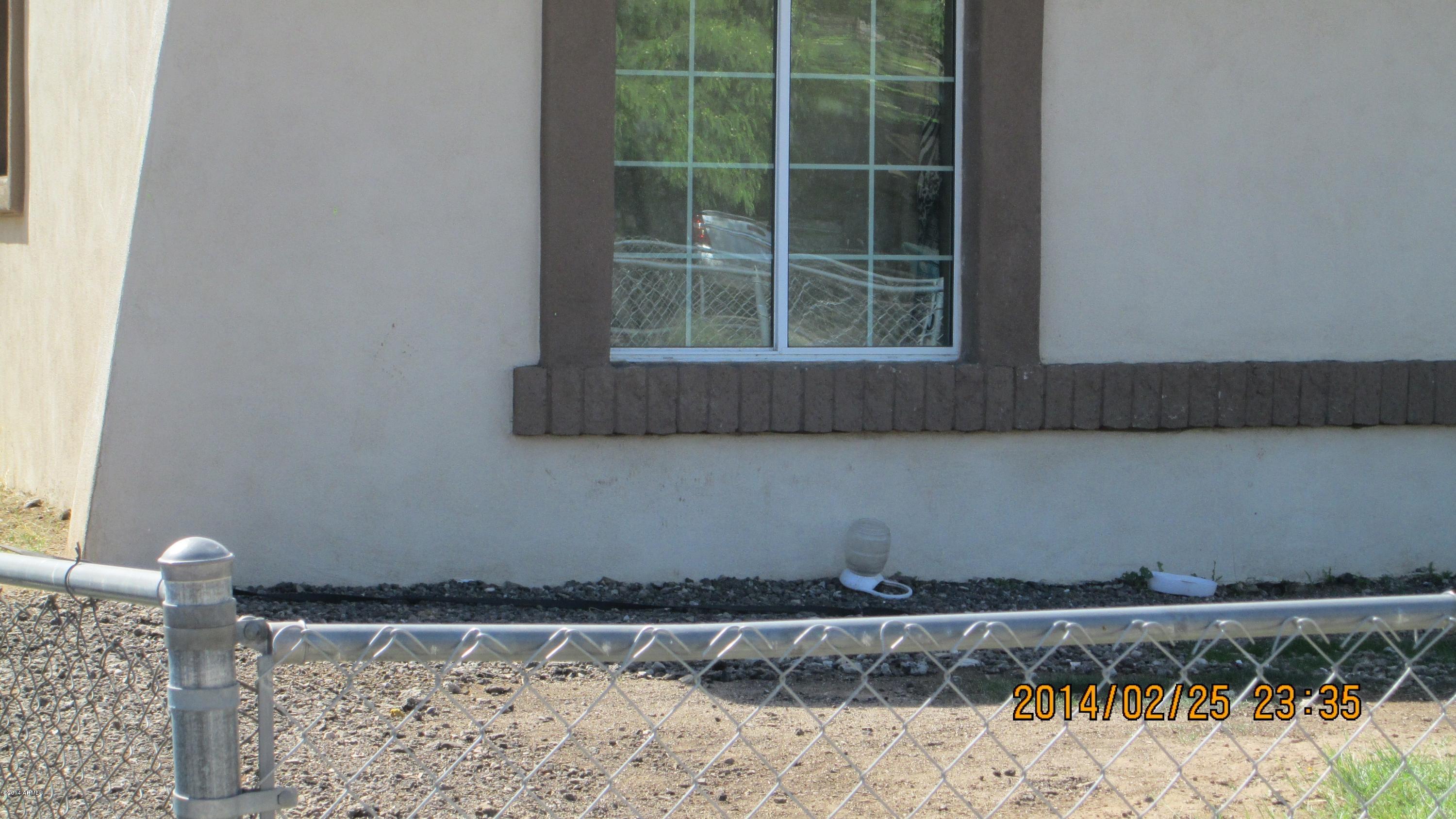 4939 West Berkeley Road Phoenix, AZ 85035 - Photo 4 of 60 a view of wooden door