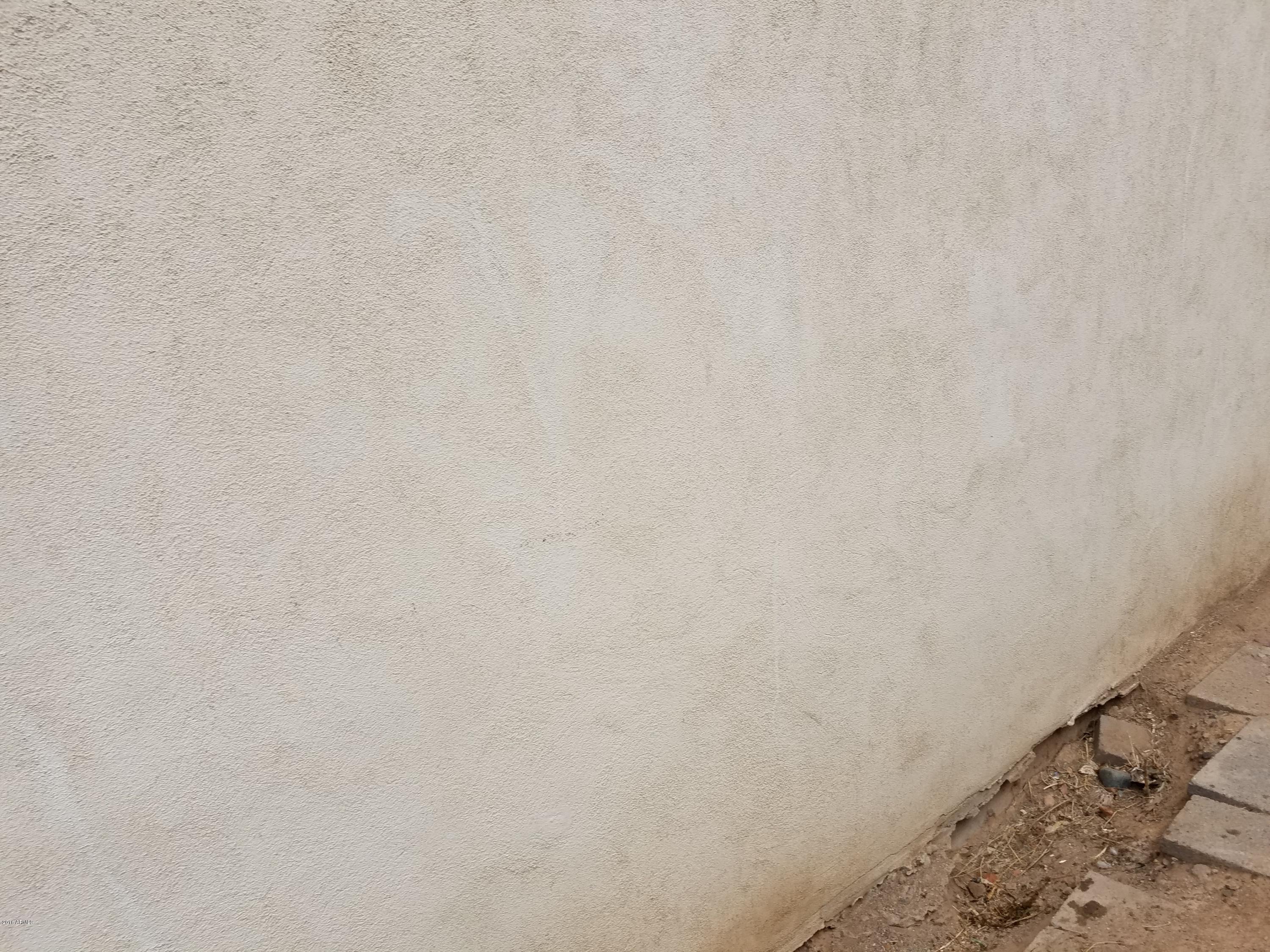 4939 West Berkeley Road Phoenix, AZ 85035 - Photo 47 of 60 a close up of a white marble wall