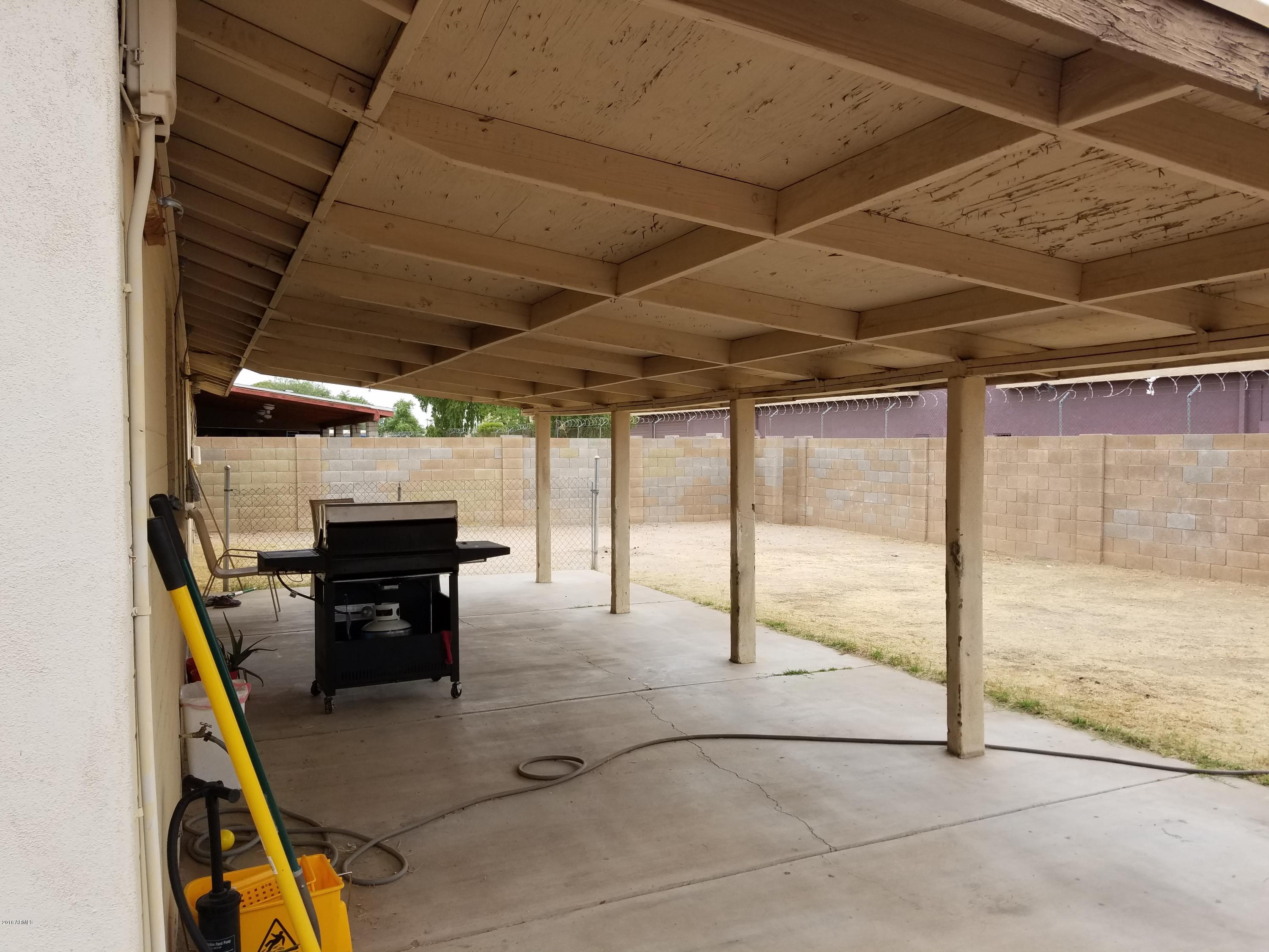 4939 West Berkeley Road Phoenix, AZ 85035 - Photo 49 of 60 a view of a room with gym equipment