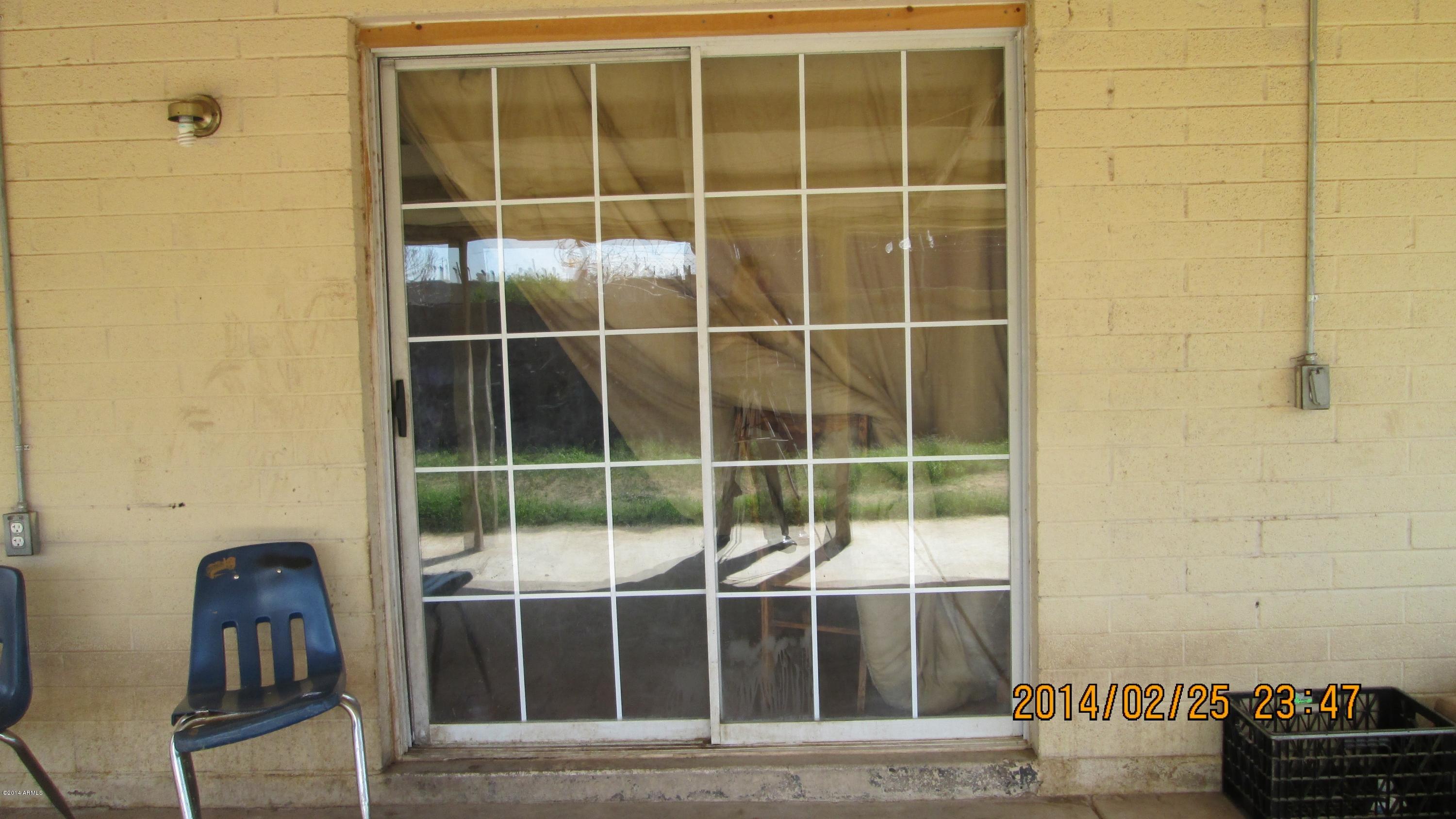 4939 West Berkeley Road Phoenix, AZ 85035 - Photo 56 of 60 a view of a front door
