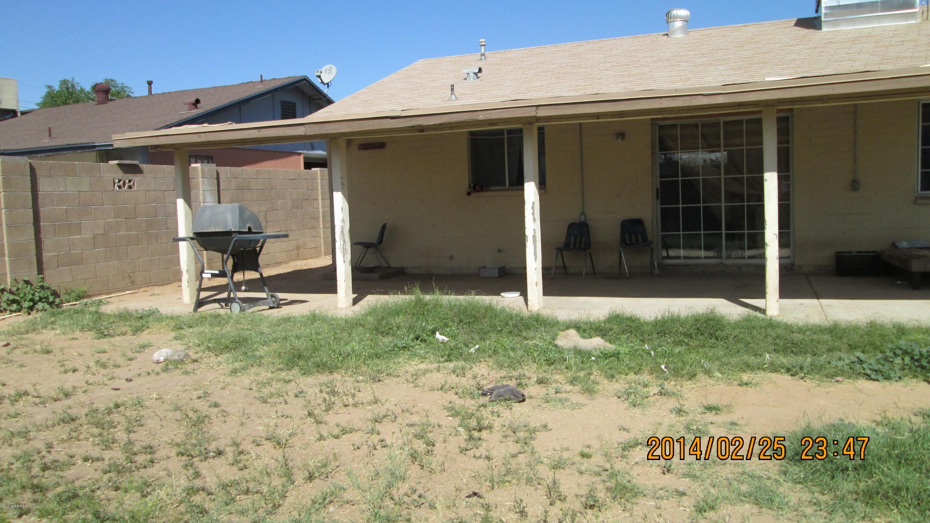4939 West Berkeley Road Phoenix, AZ 85035 - Photo 58 of 60 a view of a back yard