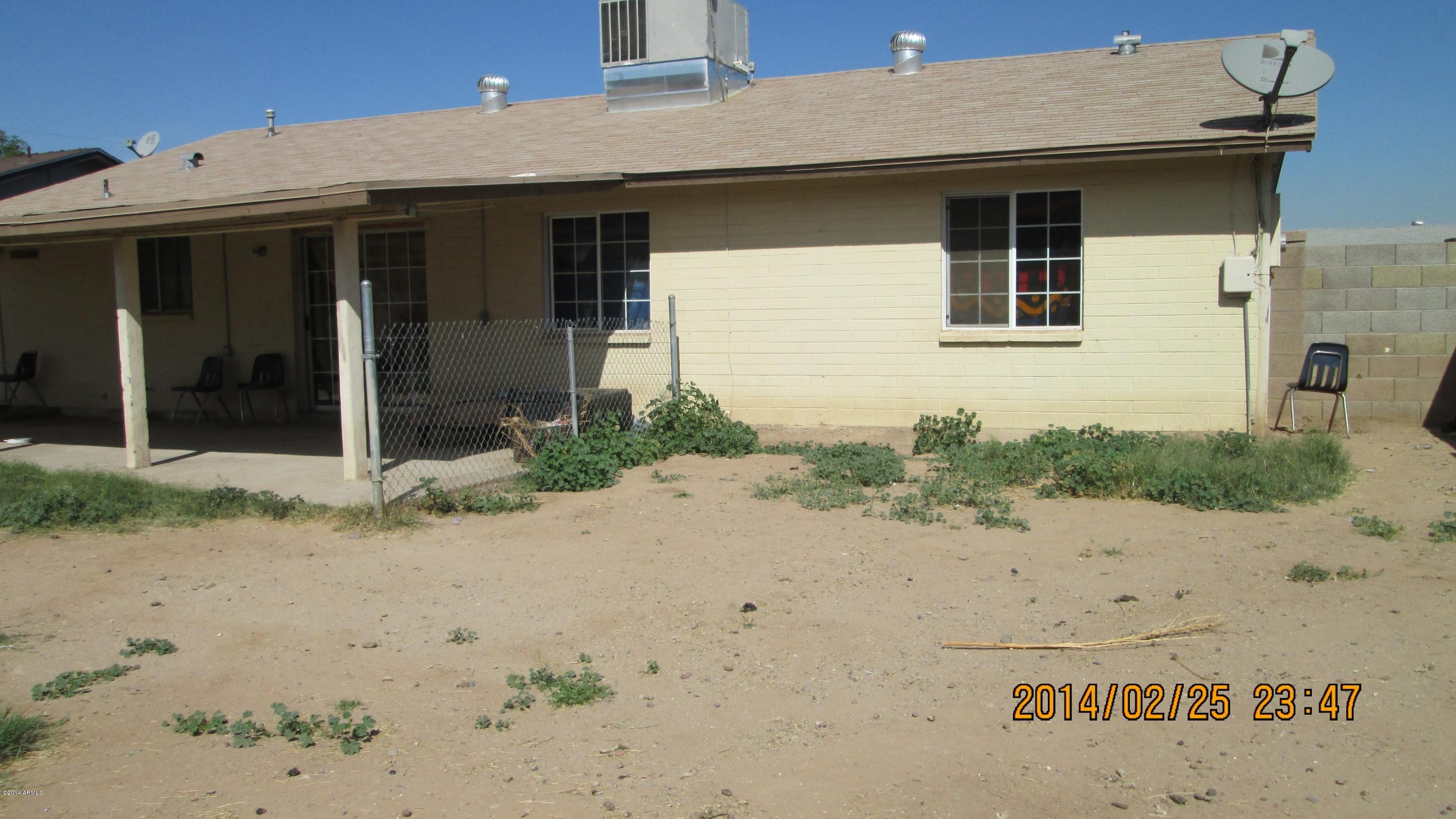 4939 West Berkeley Road Phoenix, AZ 85035 - Photo 60 of 60 a front view of a house