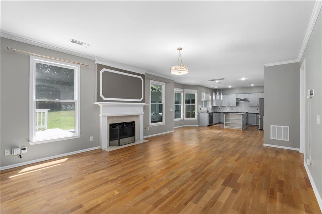 2631 East Madison Drive Atlanta, GA 30360 - Photo 15 of 66 a view of a livingroom with a fireplace and a window