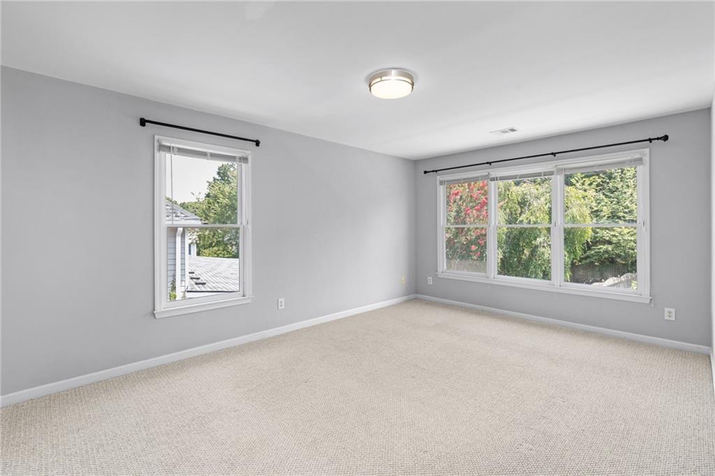 2631 East Madison Drive Atlanta, GA 30360 - Photo 28 of 66 an empty room with windows