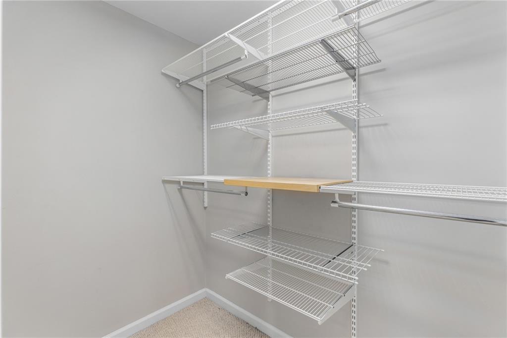 2631 East Madison Drive Atlanta, GA 30360 - Photo 37 of 66 a view of a room with racks on the wall