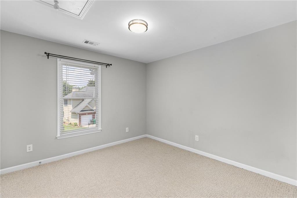 2631 East Madison Drive Atlanta, GA 30360 - Photo 43 of 66 an empty room with a window
