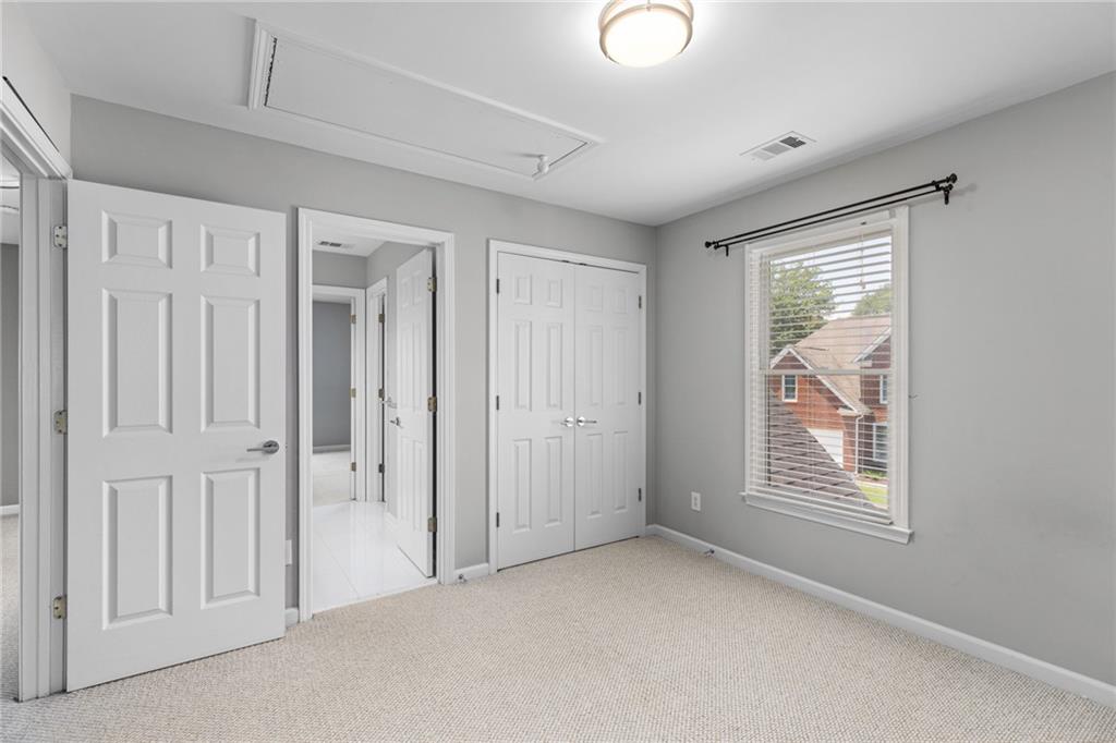 2631 East Madison Drive Atlanta, GA 30360 - Photo 44 of 66 a view of empty room with windows