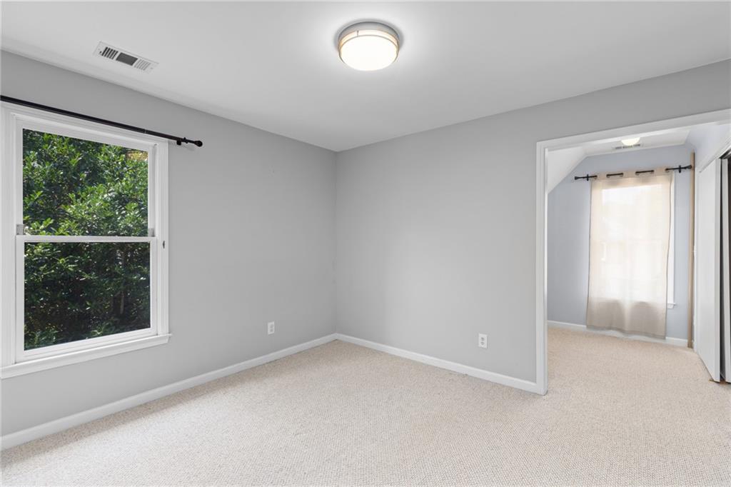 2631 East Madison Drive Atlanta, GA 30360 - Photo 48 of 66 an empty room with windows