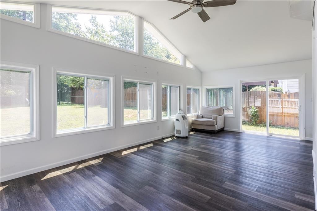 2631 East Madison Drive Atlanta, GA 30360 - Photo 54 of 66 a living room with furniture window and wooden floor
