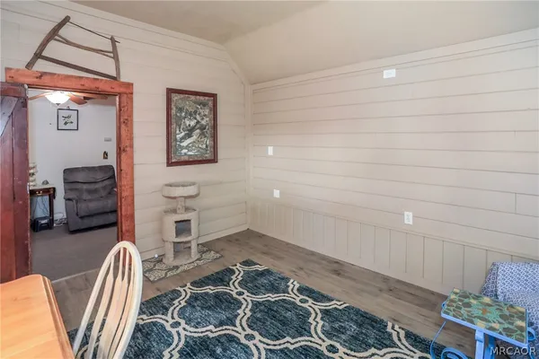 a room with furniture and a rug