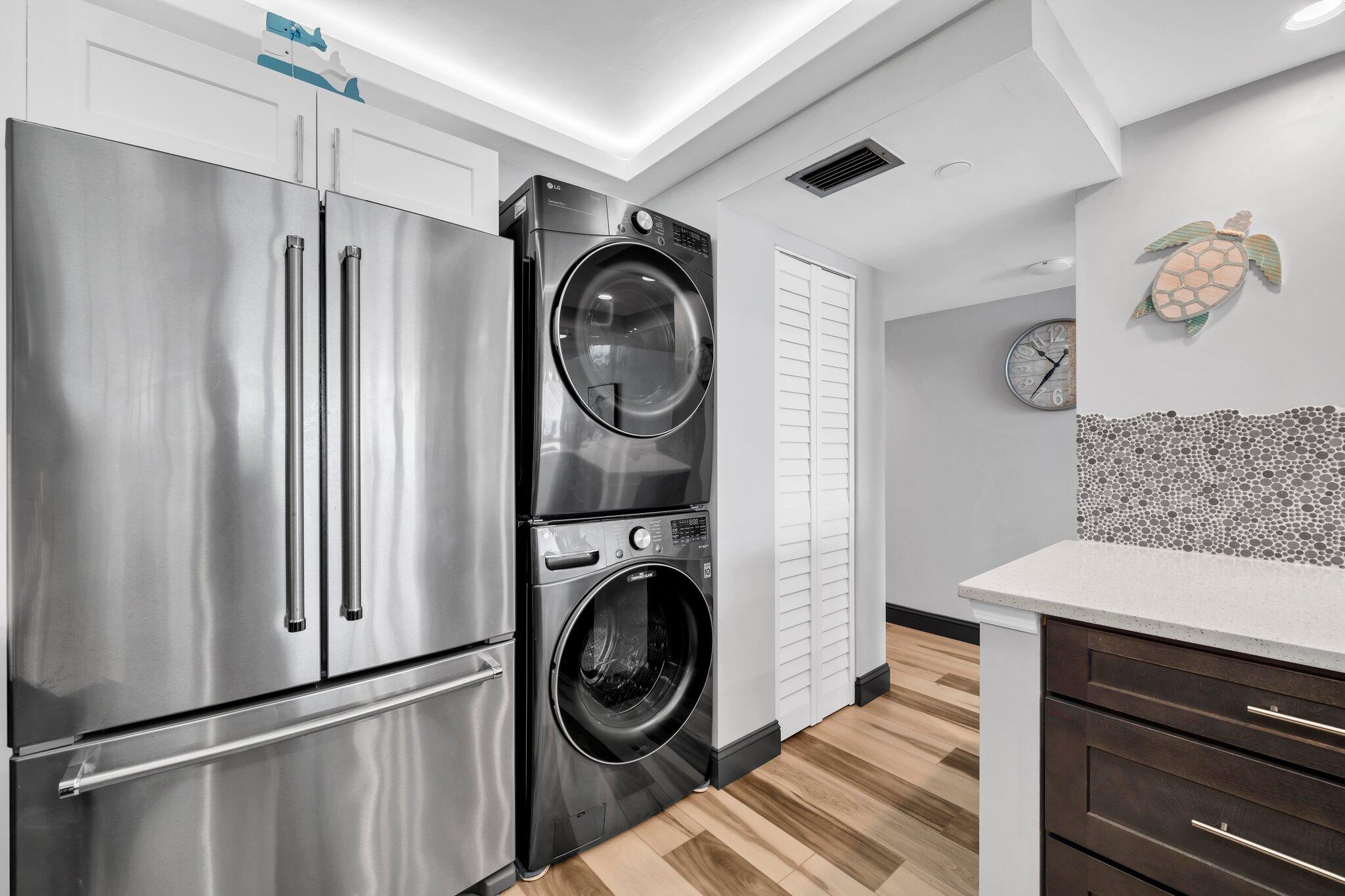 381 Santa Rosa Boulevard, Unit W515 Fort Walton Beach, FL 32548 - Photo 17 of 34 a view of a storage and utility room with washer and dryer