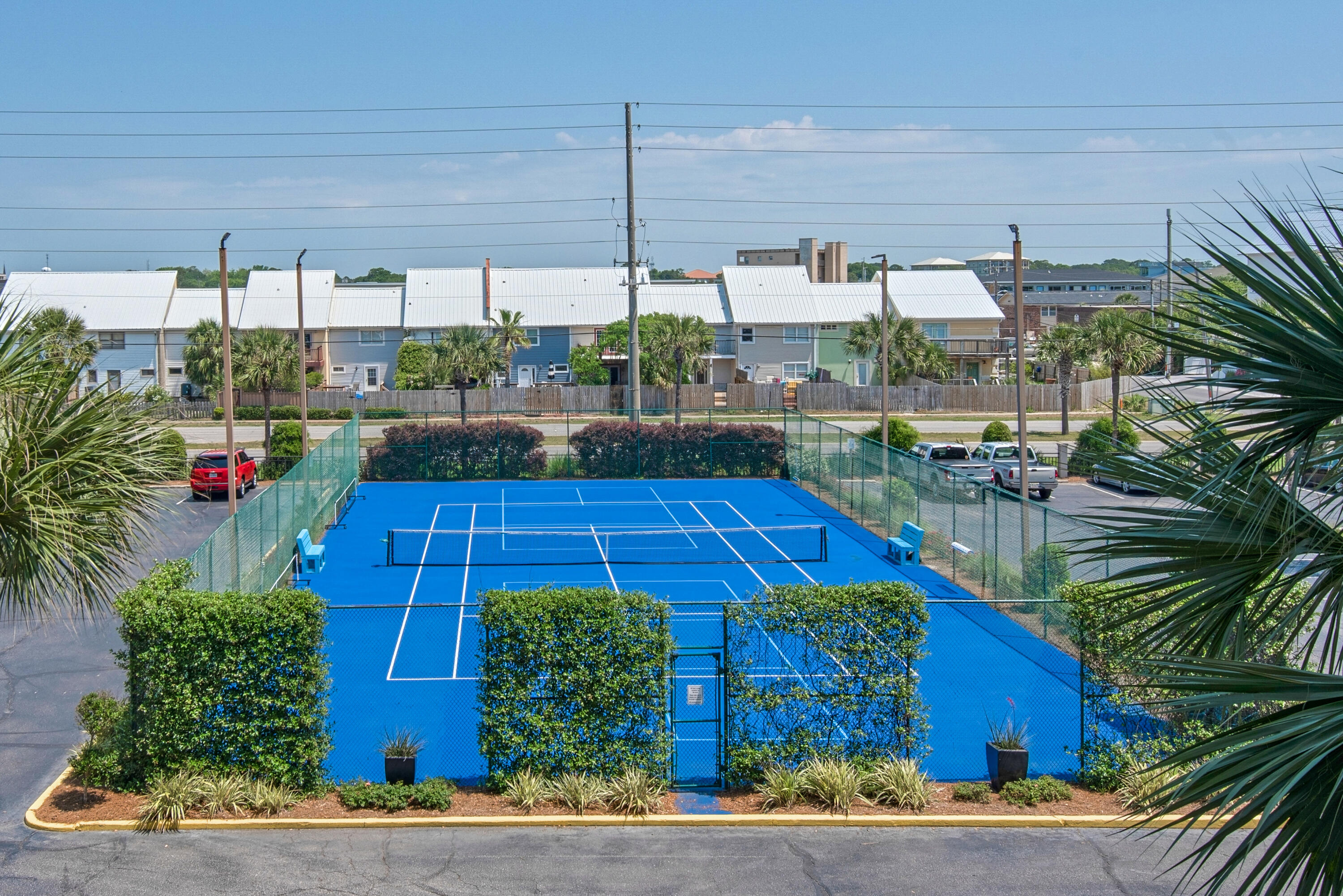 381 Santa Rosa Boulevard, Unit W515 Fort Walton Beach, FL 32548 - Photo 22 of 30 a view of a backyard with plants and outdoor seating