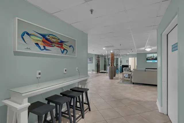 a room with furniture and tables