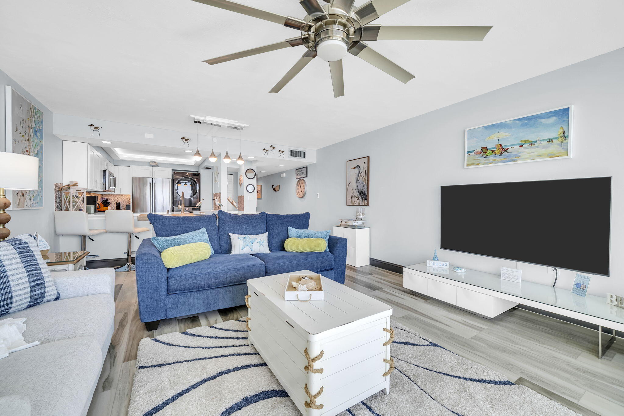 381 Santa Rosa Boulevard, Unit W515 Fort Walton Beach, FL 32548 - Photo 3 of 30 a living room with furniture and a flat screen tv