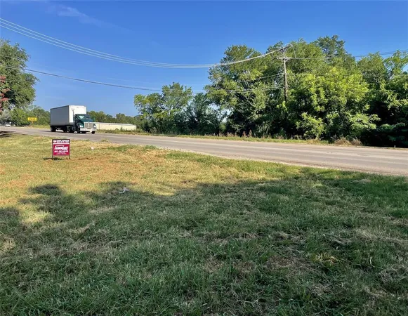 a view of swimming pool with a yard