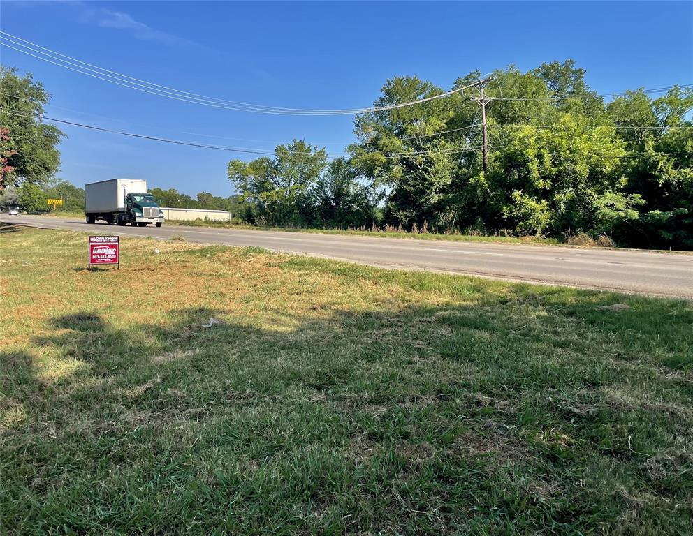 815 Culver Street Commerce, TX 75428 - Photo 4 of 4 a view of swimming pool with a yard