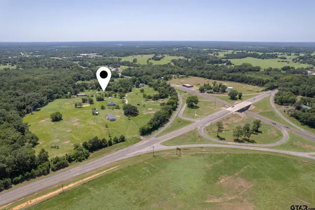 a view of a lake with a swimming pool