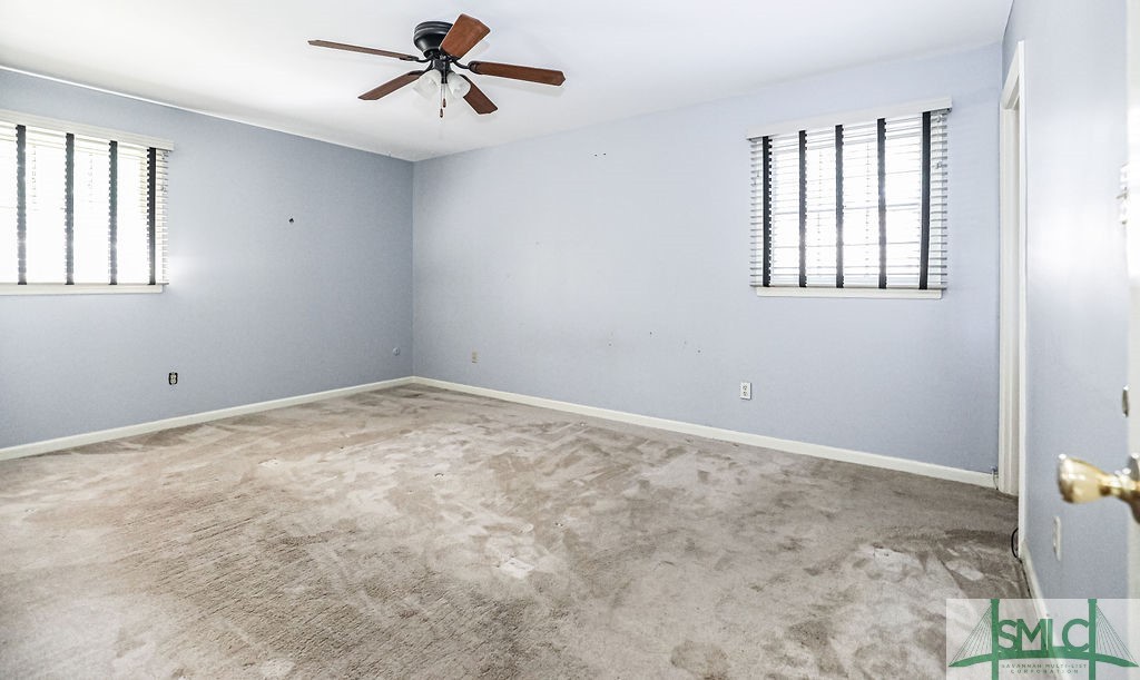 609 Windsor Road Savannah, GA 31419 - Photo 29 of 49 Second Bedroom and the Primary with bathroom and w