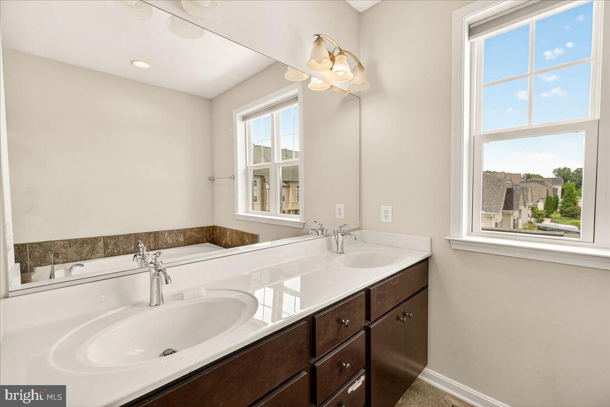 519 Prieur Road Frederick, MD 21701 - Photo 20 of 77 a bathroom with a sink and a window