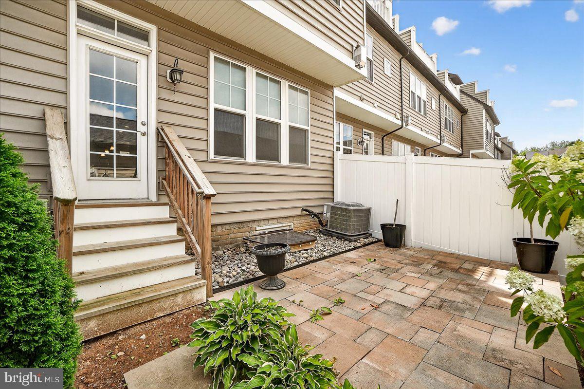 519 Prieur Road Frederick, MD 21701 - Photo 47 of 77 a view of a house with backyard and sitting area