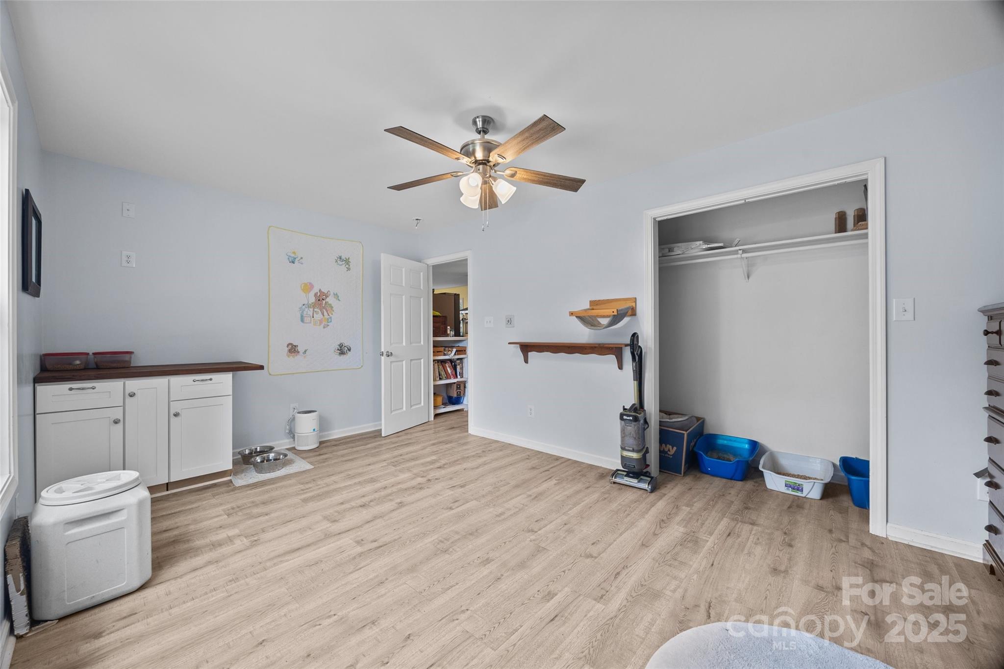 1845 State Rd S-46-149 Clover, SC 29710 - Photo 20 of 48 a view of a room with cabinet and a ceiling fan