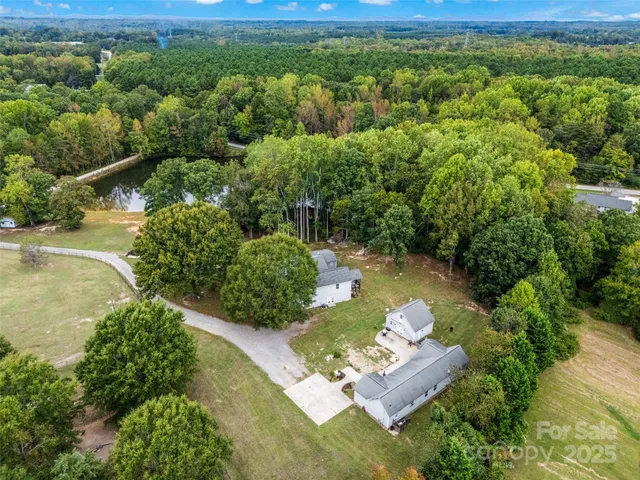 a view of a lake with a yard