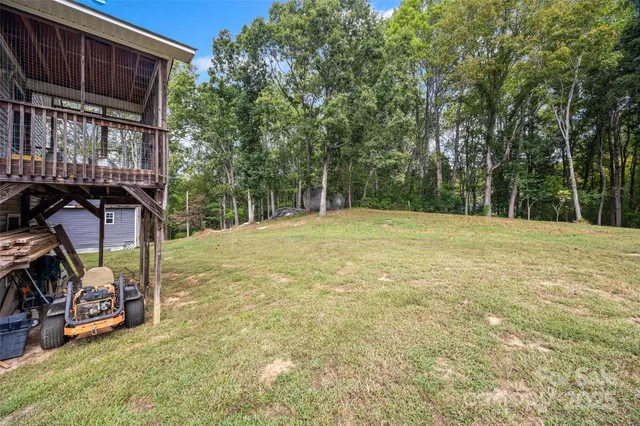 a view of a yard with garage