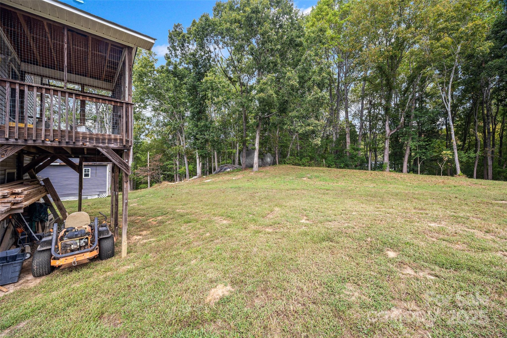 1845 State Rd S-46-149 Clover, SC 29710 - Photo 35 of 48 a view of a yard with garage