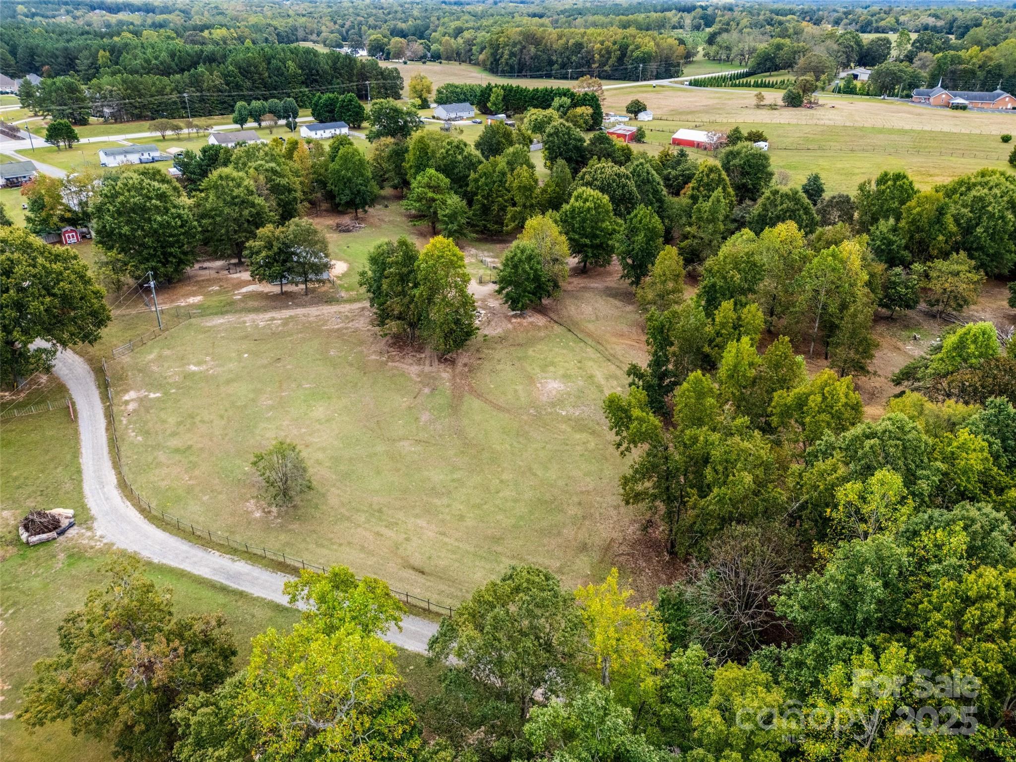 1845 State Rd S-46-149 Clover, SC 29710 - Photo 46 of 48 an aerial view of residential houses with outdoor space and trees