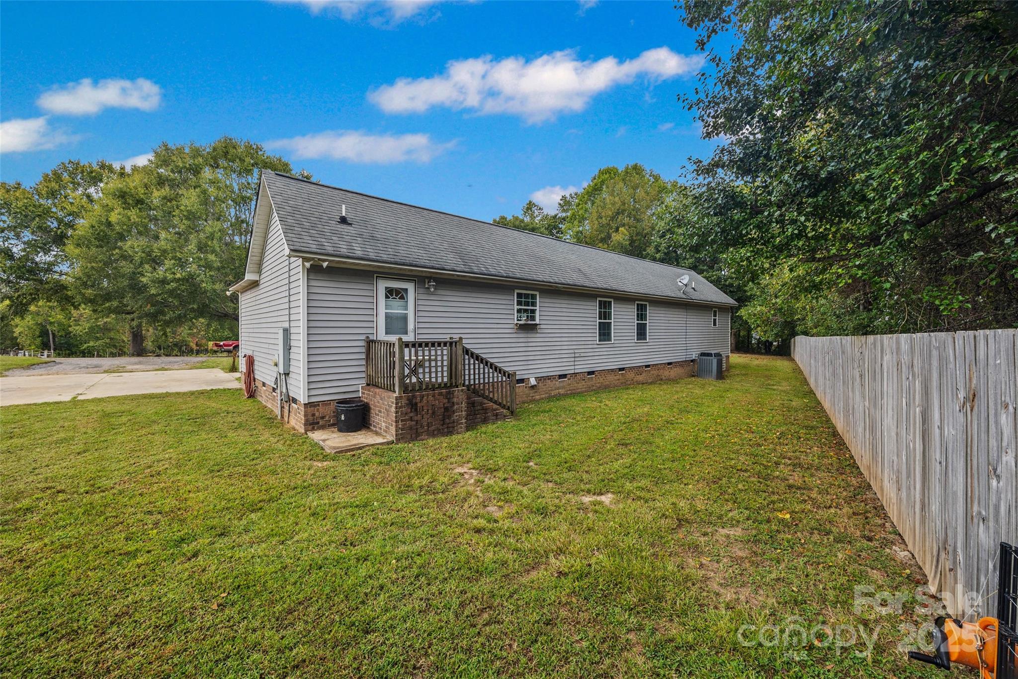 1845 State Rd S-46-149 Clover, SC 29710 - Photo 5 of 48 a view of a house with backyard and garden