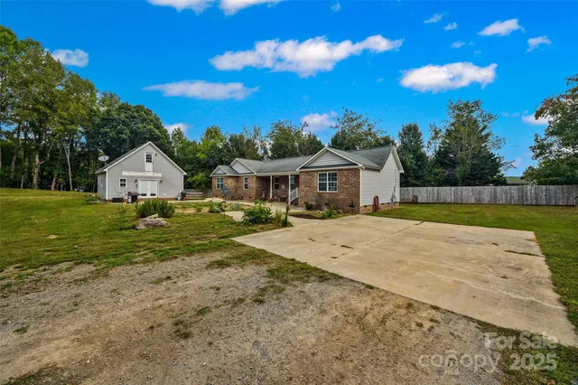a house with garden in front of it