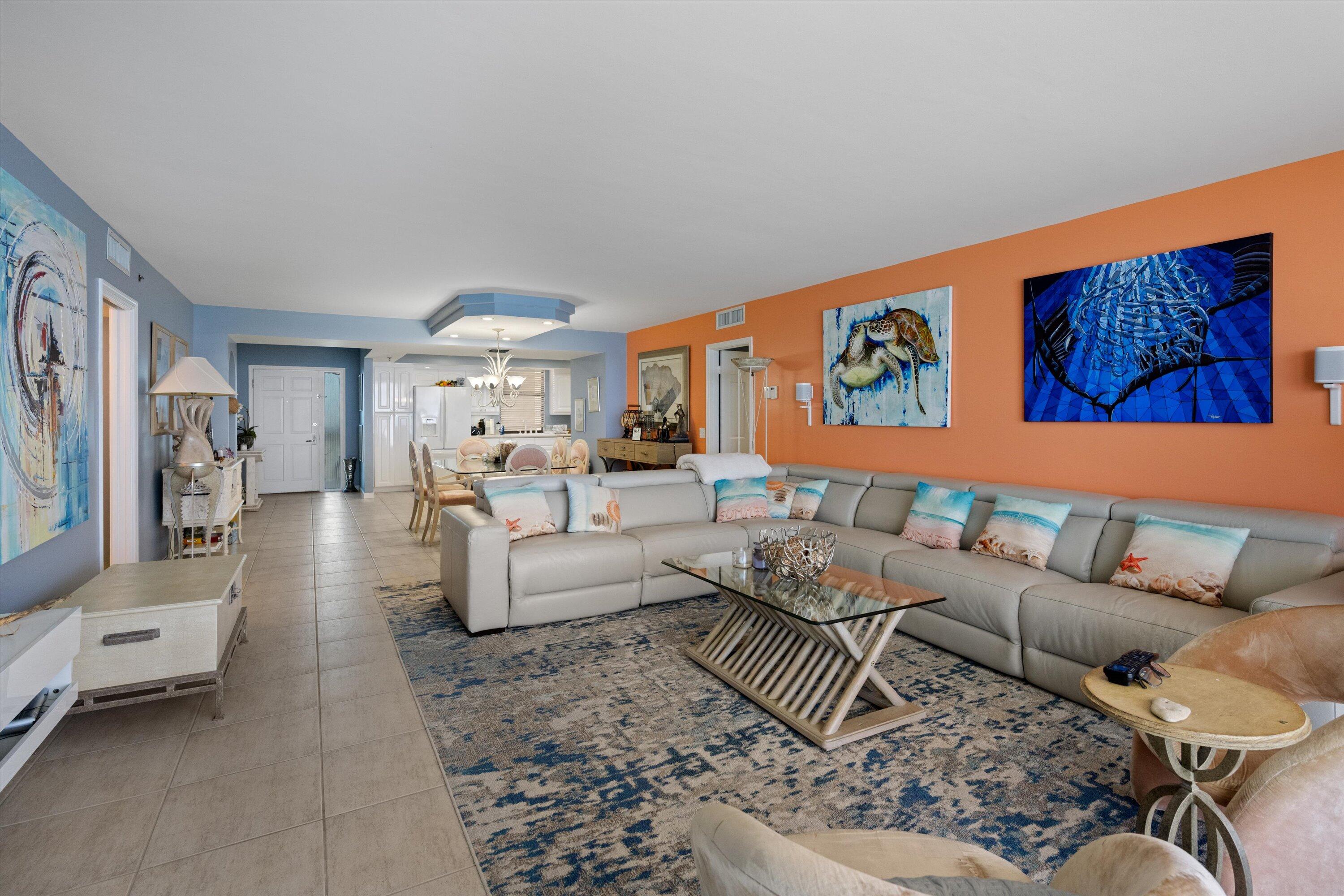 100 South Beach Road, Unit 702 Jupiter, FL 33469 - Photo 6 of 36 a living room with furniture and a large window