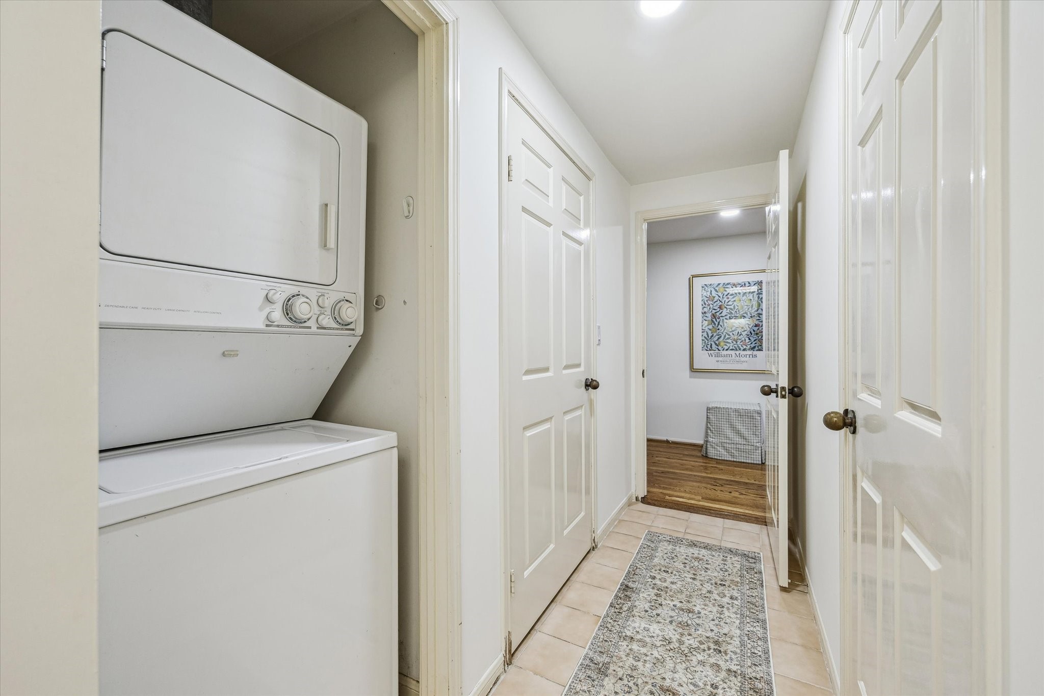 2001 Holcombe Boulevard, Unit 504 Houston, TX 77030 - Photo 16 of 38 Stacked washer/dryer and a large pantry.
