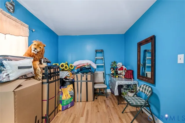 a room with furniture a washer and dryer