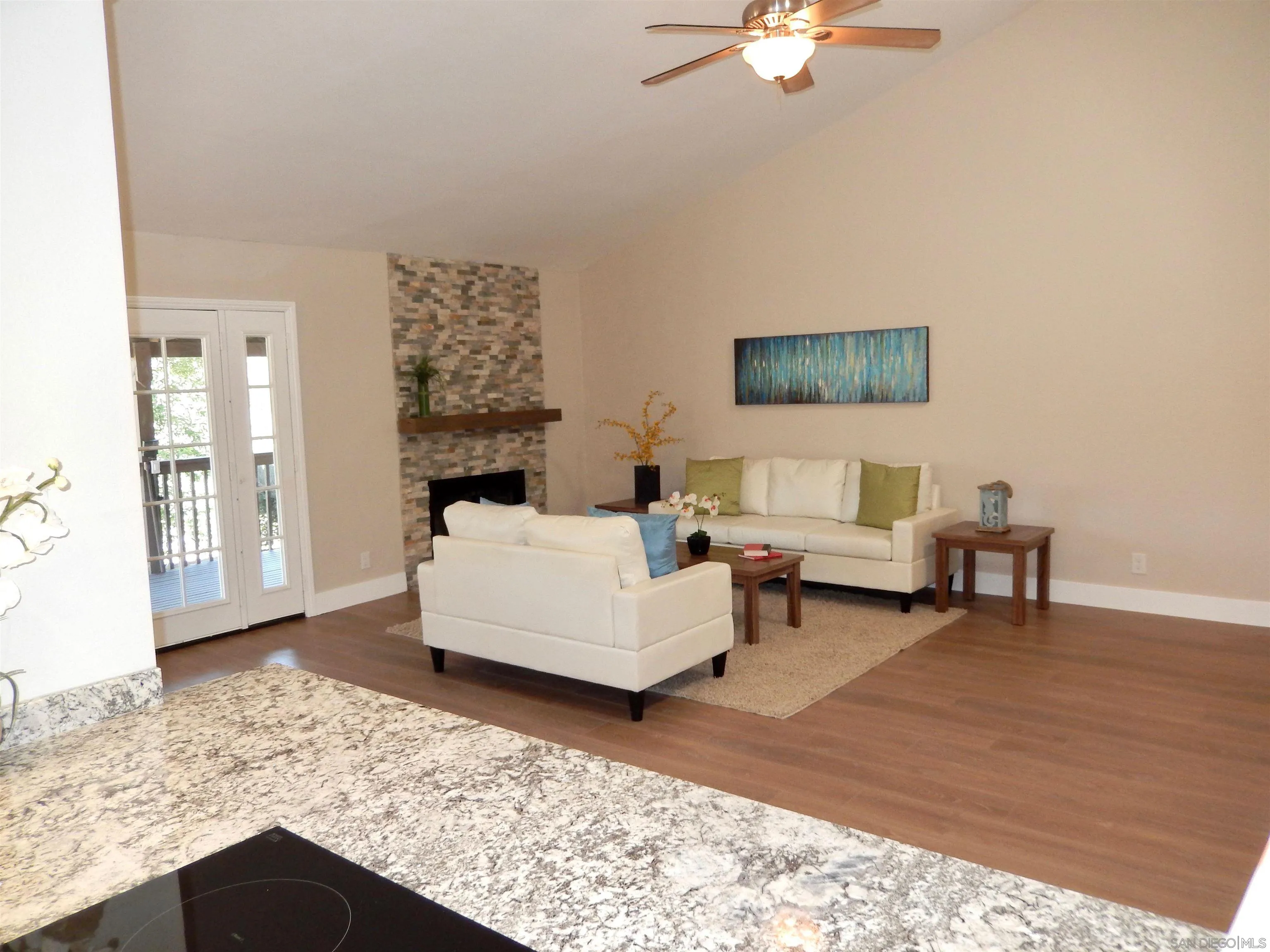 4959 Sleeping Indian Road Fallbrook, CA 92028 - Photo 6 of 22 a living room with furniture and a rug