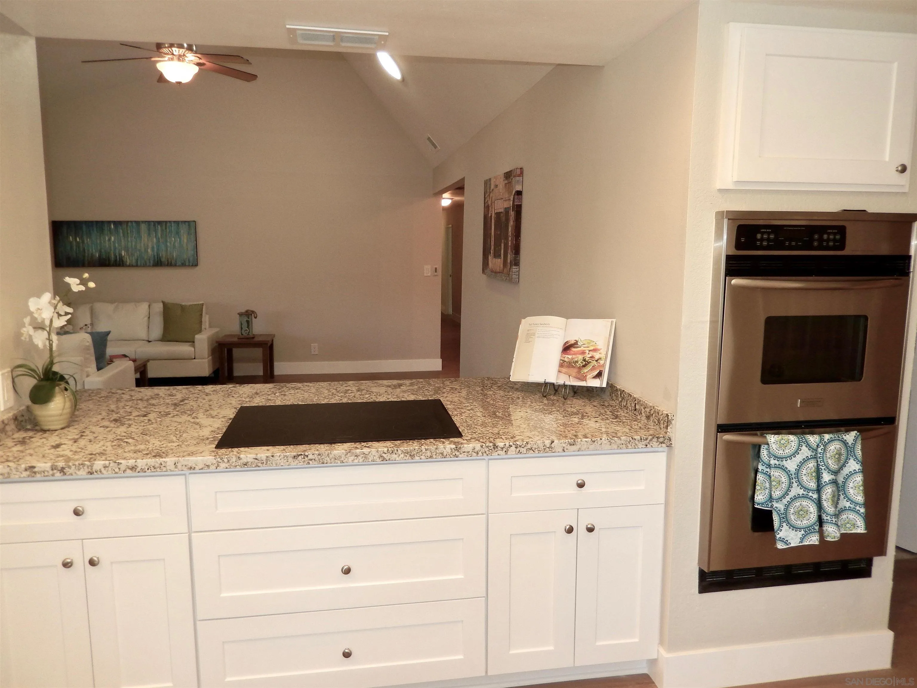 4959 Sleeping Indian Road Fallbrook, CA 92028 - Photo 10 of 22 a kitchen with a stove and cabinets