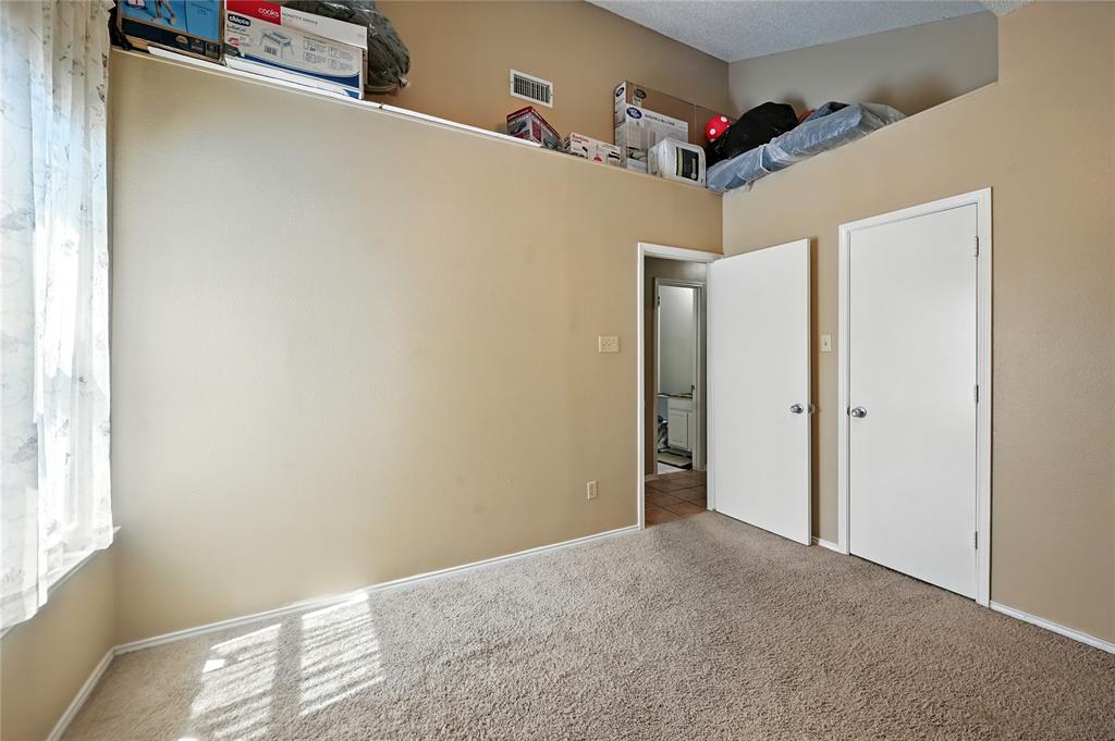 7741 Misty Ridge Drive North Fort Worth, TX 76137 - Photo 21 of 29 a view of a hallway with closet